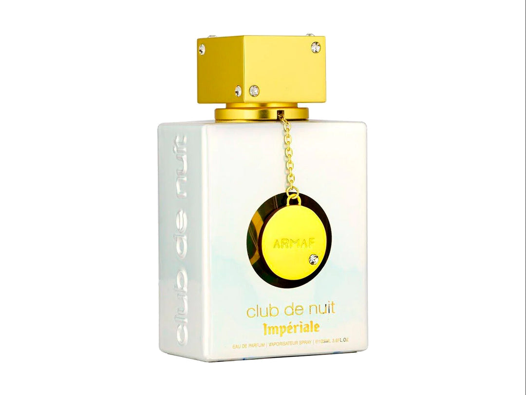 Perfume Armaf Club de Nuit Impériale para mujer en frasco blanco con detalles dorados y su caja correspondiente.