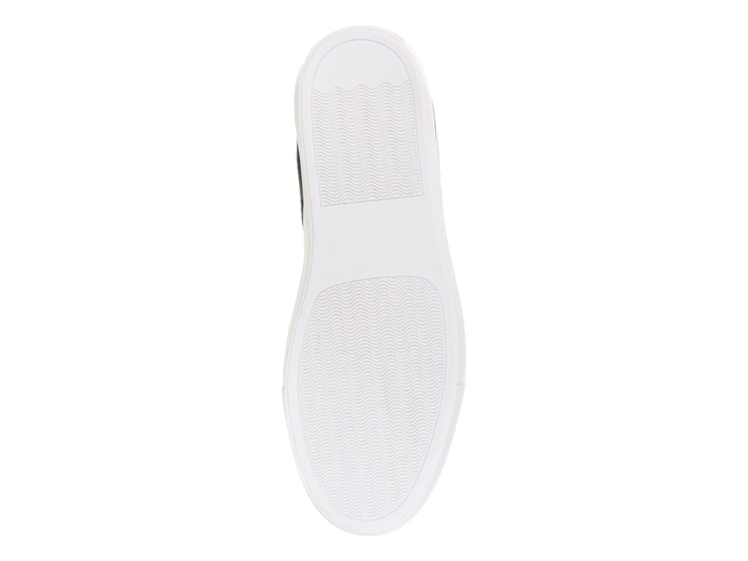 Tenis Guess de corte bajo en colores blanco y negro con suela blanca y logotipo lateral.
