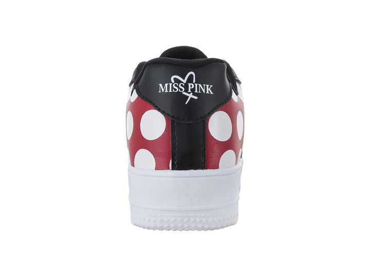 Tenis blancos y negros con sección roja de lunares blancos y la palabra &
