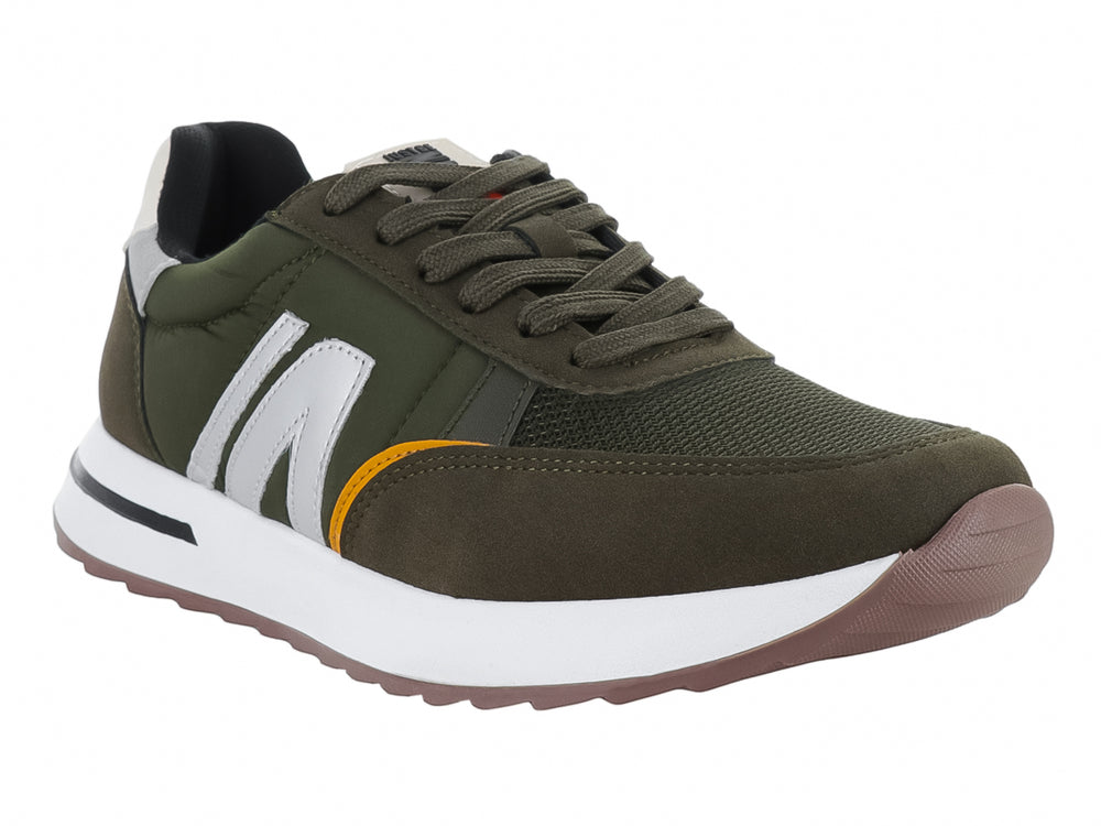 Tenis infantiles color verde con detalles en blanco y suela blanca.