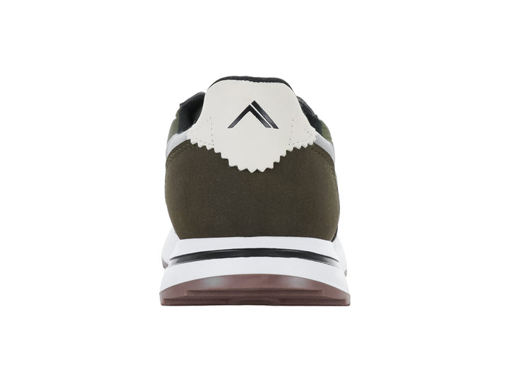 Tenis infantiles color verde con detalles en blanco y suela blanca.