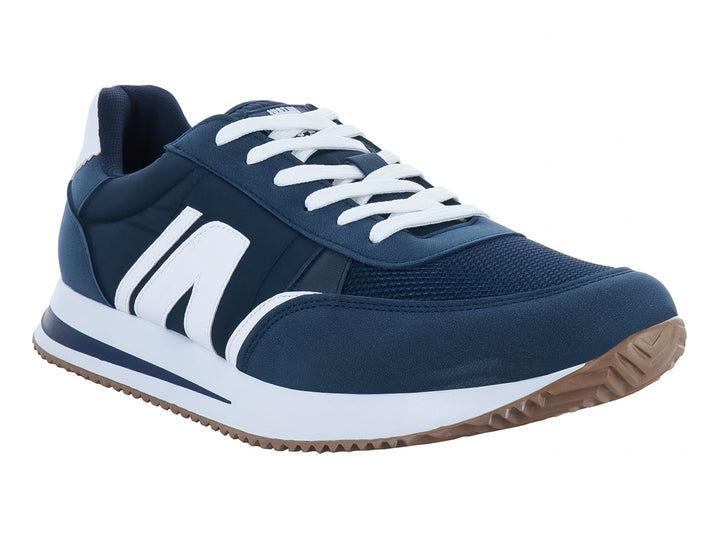Tenis deportivos color marino con detalles en blanco y suela café.