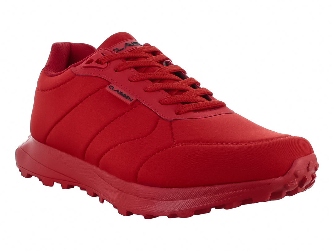 Tenis deportivos Clasben modelo Tigo en color rojo intenso con suela texturizada y diseño monocromático.