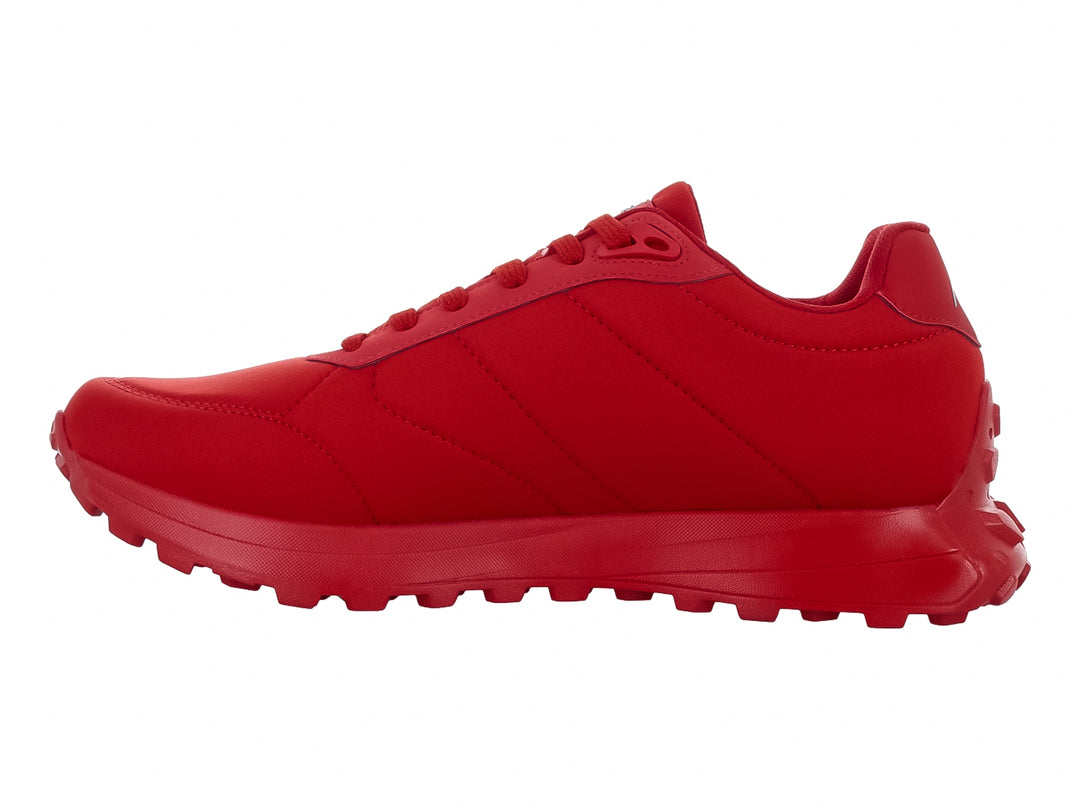 Tenis deportivos Clasben modelo Tigo en color rojo intenso con suela texturizada y diseño monocromático.