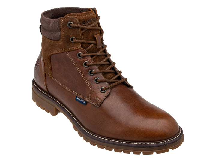 Bota casual de cuero color café con detalles en gamuza y suela dentada.