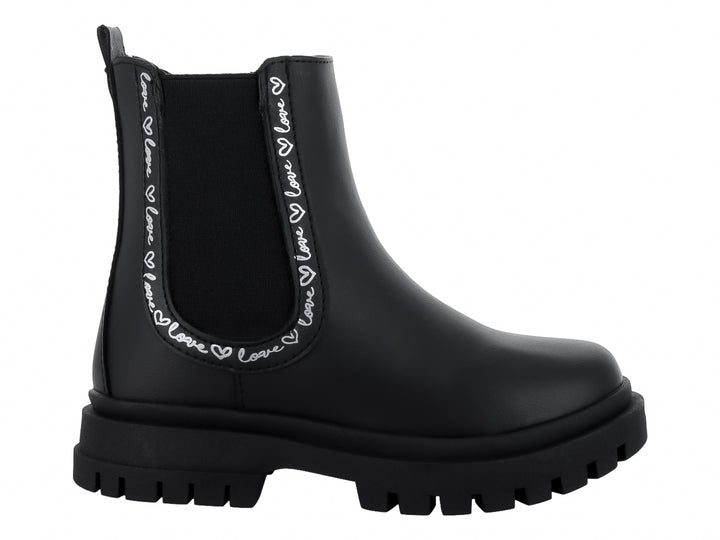 Bota negra de caña corta con suela track gruesa y detalles blancos en el lateral.
