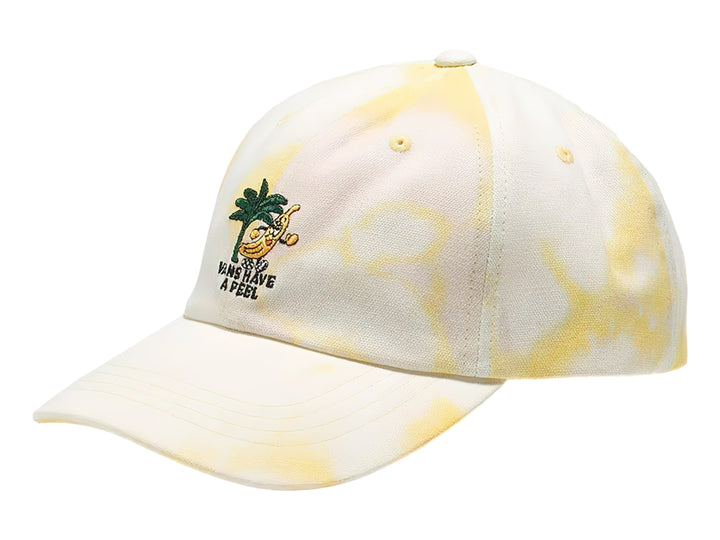Gorra VANS con diseño tie-dye en tonos blanco y amarillo, visera curva y bordado tropical frontal.