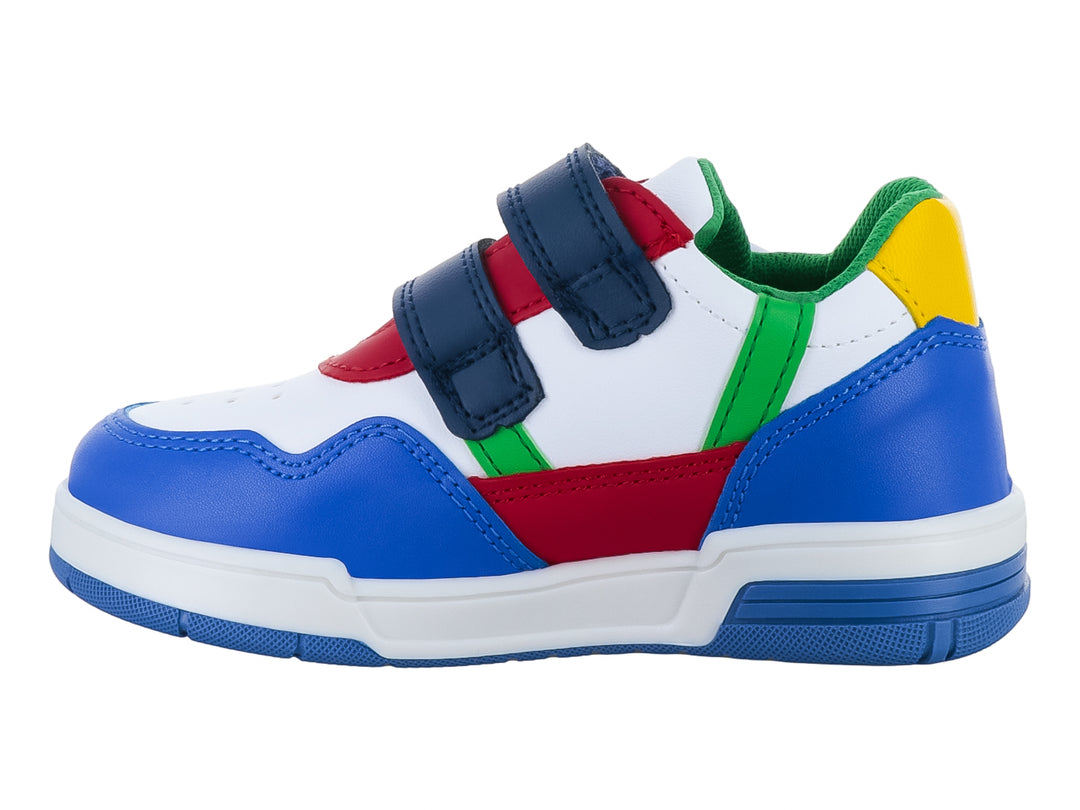 Tenis infantiles multicolor en azul, blanco, rojo y verde con cierre de velcro.