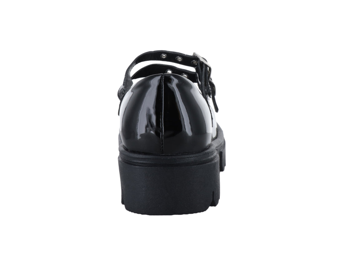 Zapato Mary Jane de charol negro con plataforma gruesa y doble correa con hebillas plateadas.