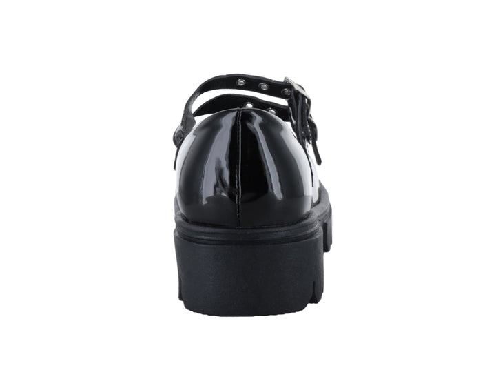Zapato Mary Jane de charol negro con plataforma gruesa y doble correa con hebillas plateadas.