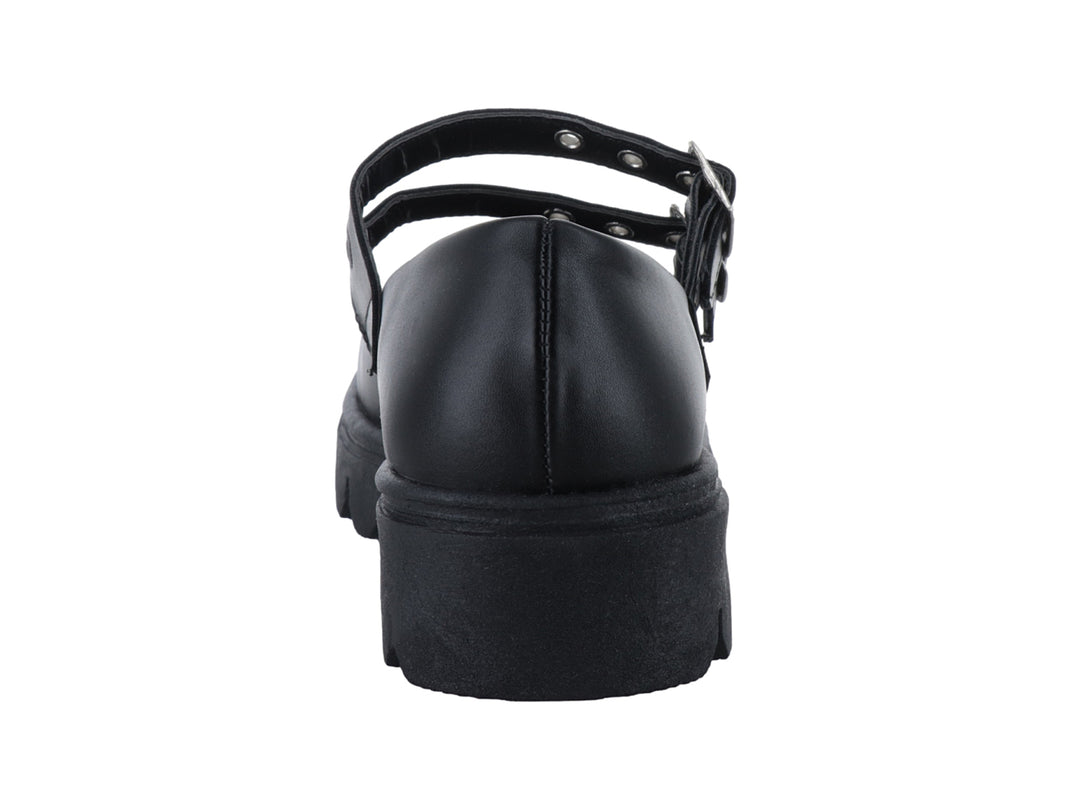 Zapato negro con suela de plataforma gruesa y dos correas con hebillas plateadas.