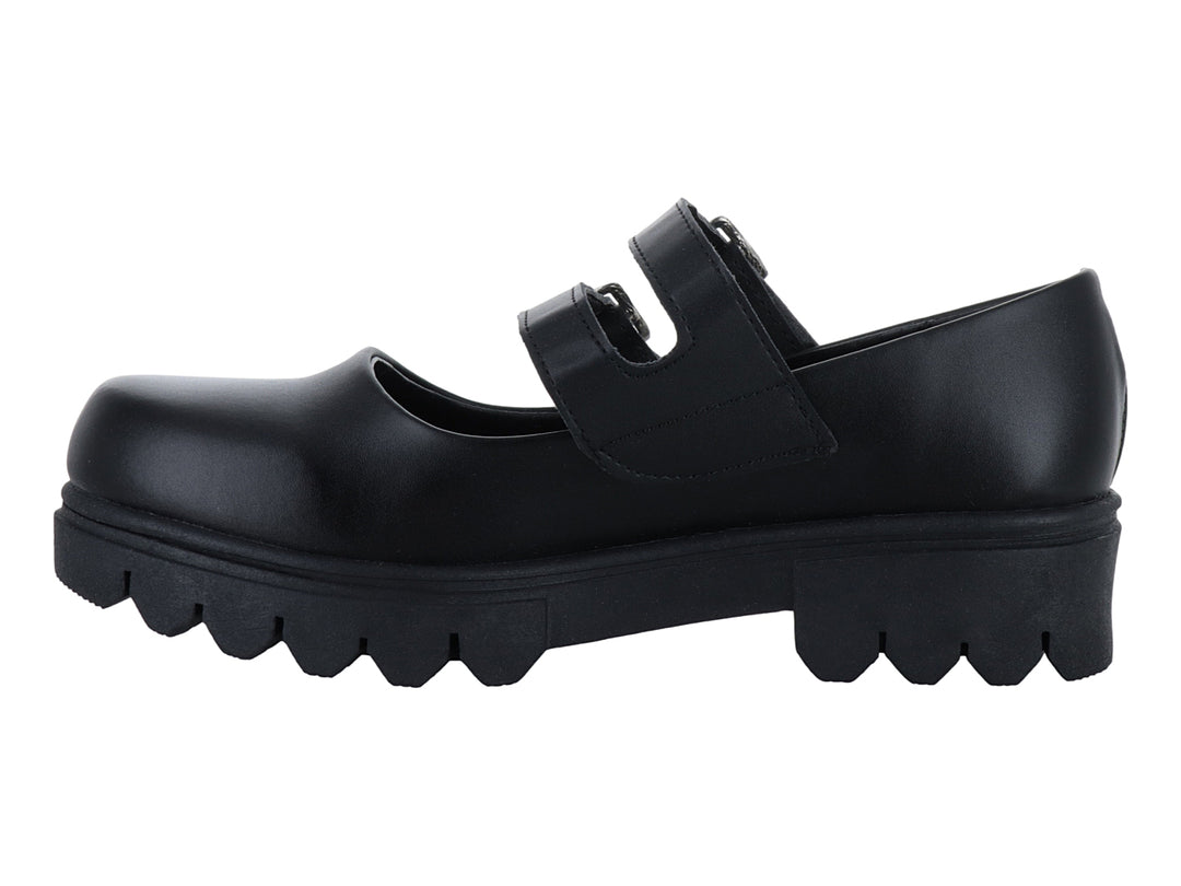 Zapato negro con suela de plataforma gruesa y dos correas con hebillas plateadas.