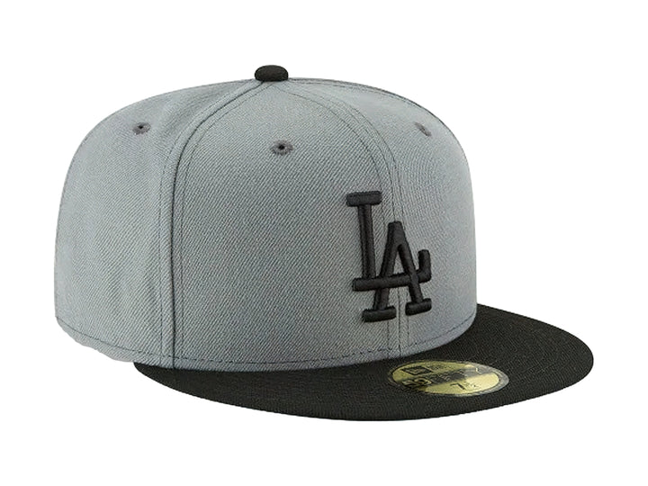 Gorra New Era de los Angeles Dodgers en color gris con visera y logotipo bordado en negro.