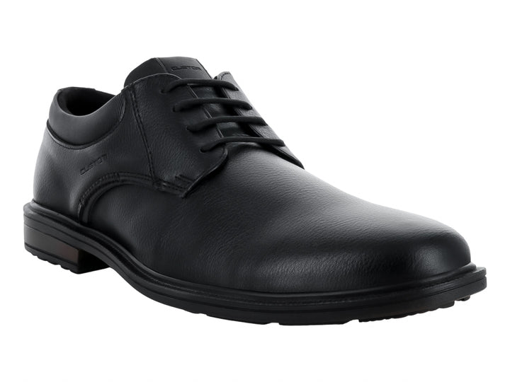 Zapato formal negro de cuero con cordones y suela oscura.