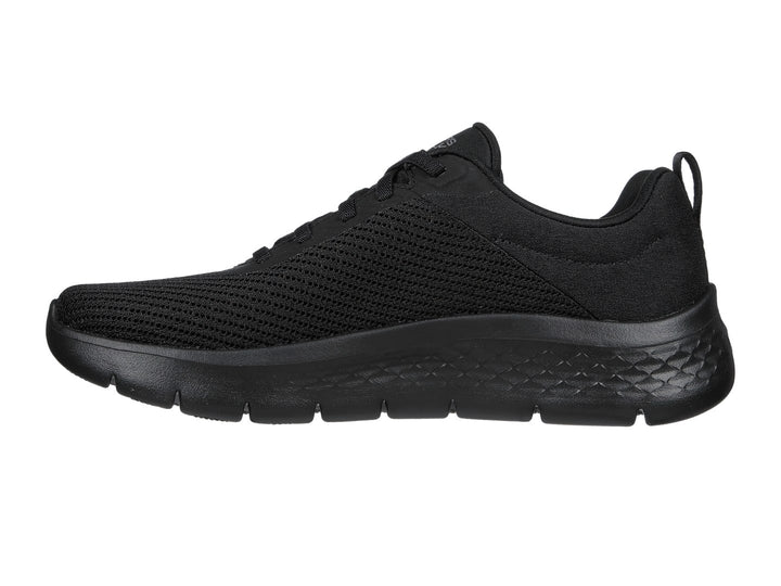 Tenis deportivos Skechers Go Walk Flex en color negro total con tejido de malla y suela flexible.