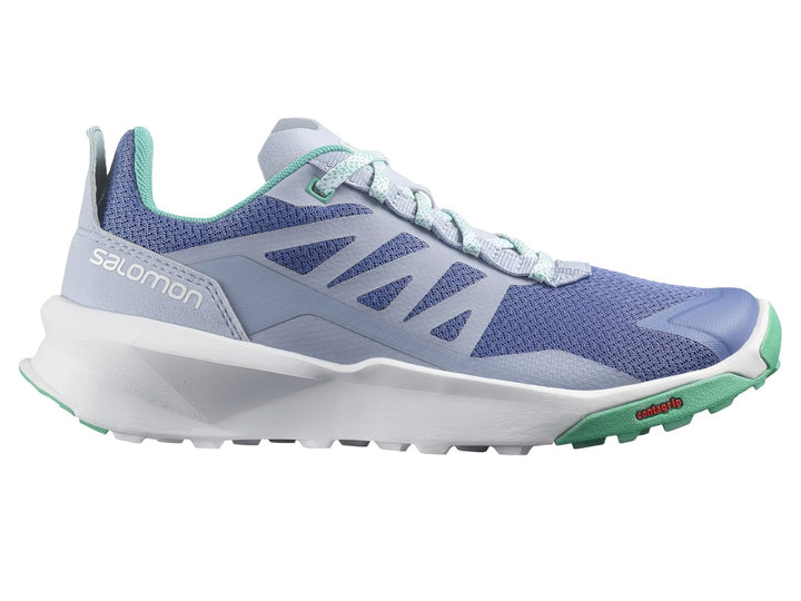 Tenis deportivos Salomon en color morado con suela blanca y detalles en verde.
