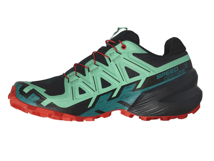 Tenis Salomon Speedcross 6 en colores azul, negro y rojo con suela agresiva para trail running.
