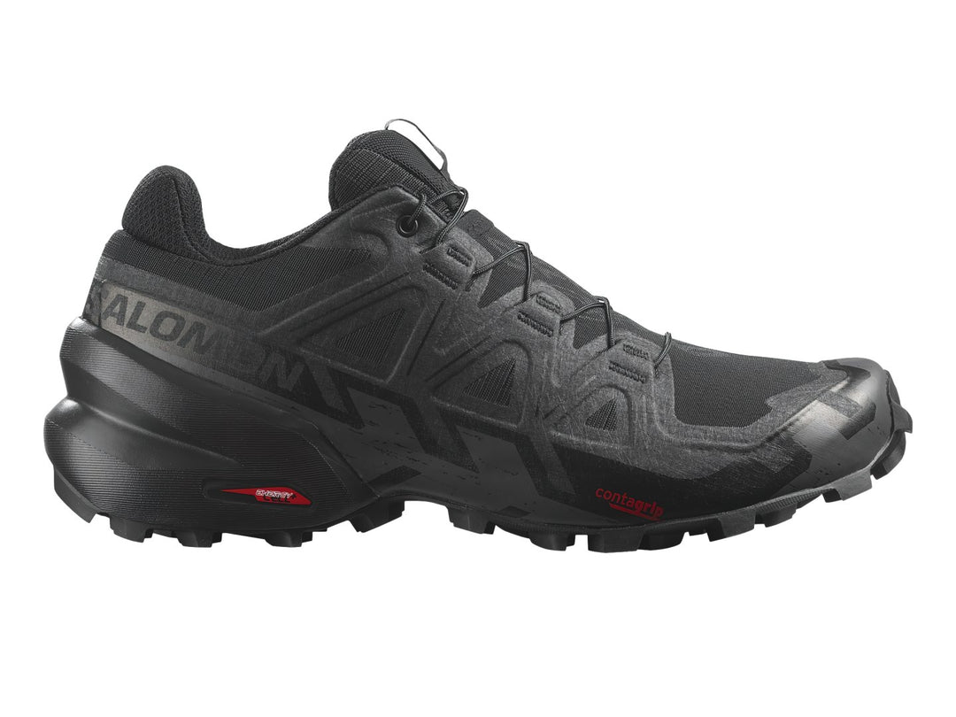 Tenis deportivos Salomon Speedcross 6 en color negro, diseñados para trail running con suela rugosa.