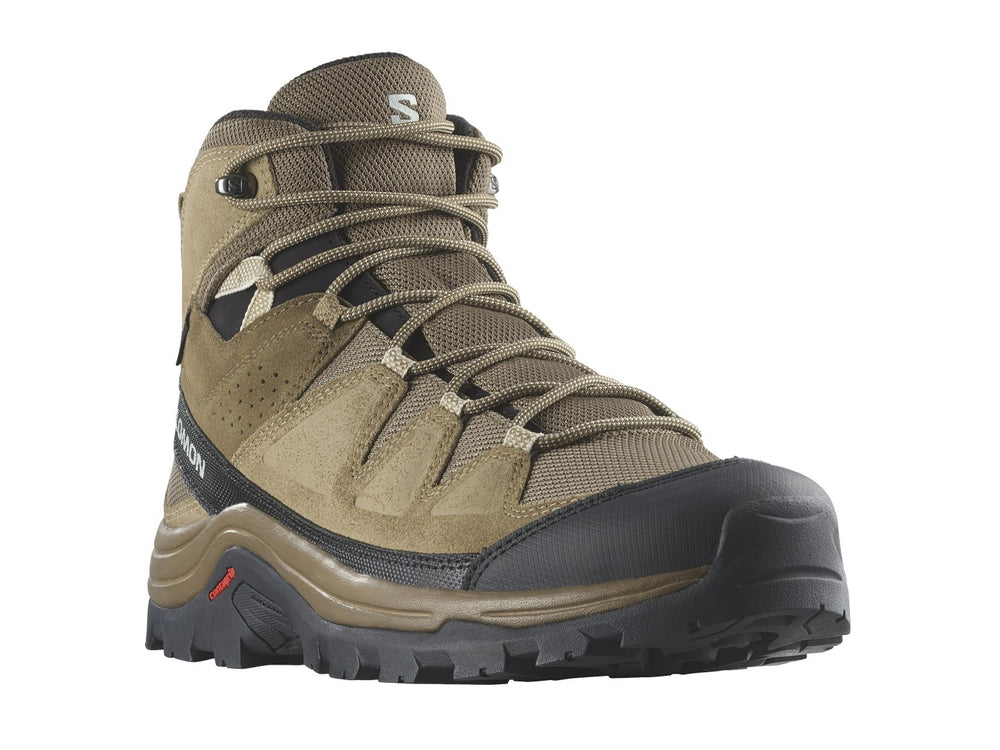 Bota de senderismo Salomon Quest Rove GTX color café con suela negra y detalles técnicos.