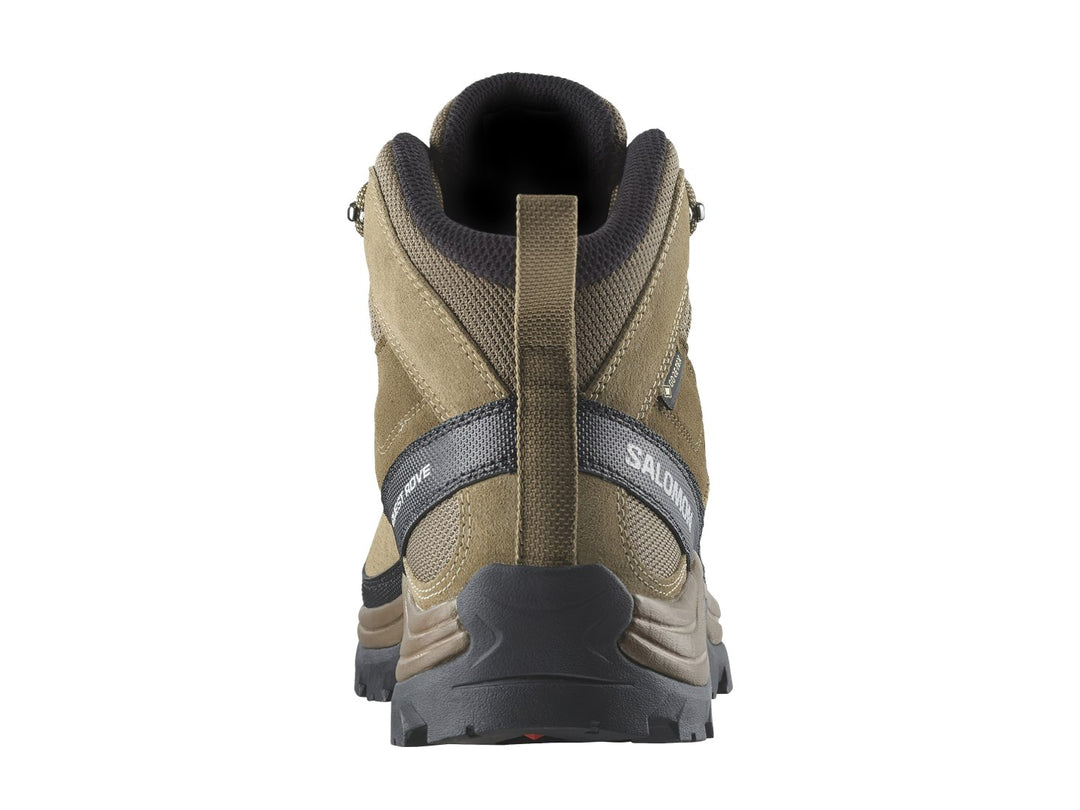 Bota de senderismo Salomon Quest Rove GTX color café con suela negra y detalles técnicos.