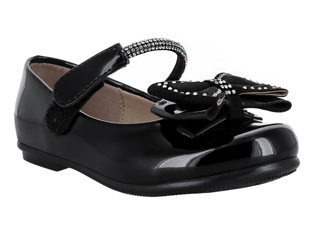 Zapato negro de charol para Niña con moño y detalles brillantes en la correa y el frente.
