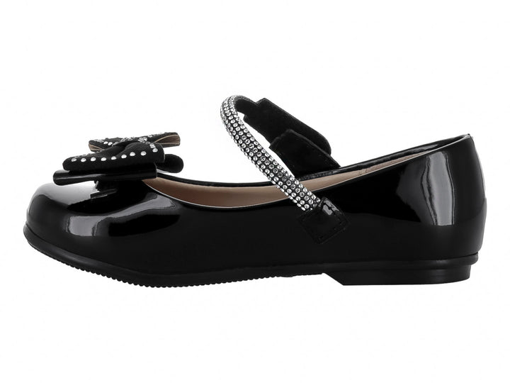 Zapato negro de charol para Niña con moño y detalles brillantes en la correa y el frente.