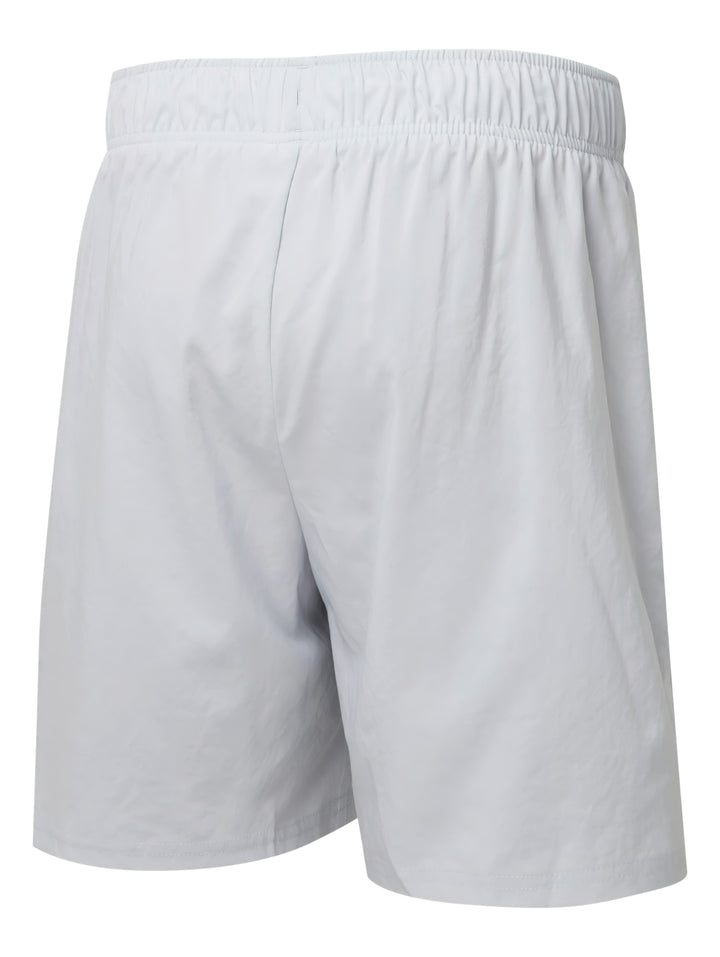 Pantalones cortos deportivos PUMA color gris platino con cintura elástica.