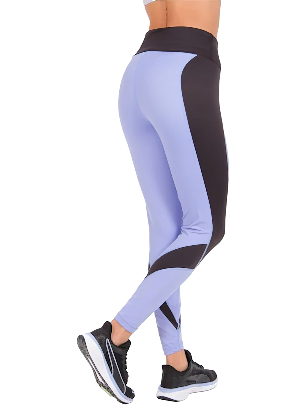 Leggings deportivos PUMA color morado con paneles negros, cintura alta y corte 7/8.