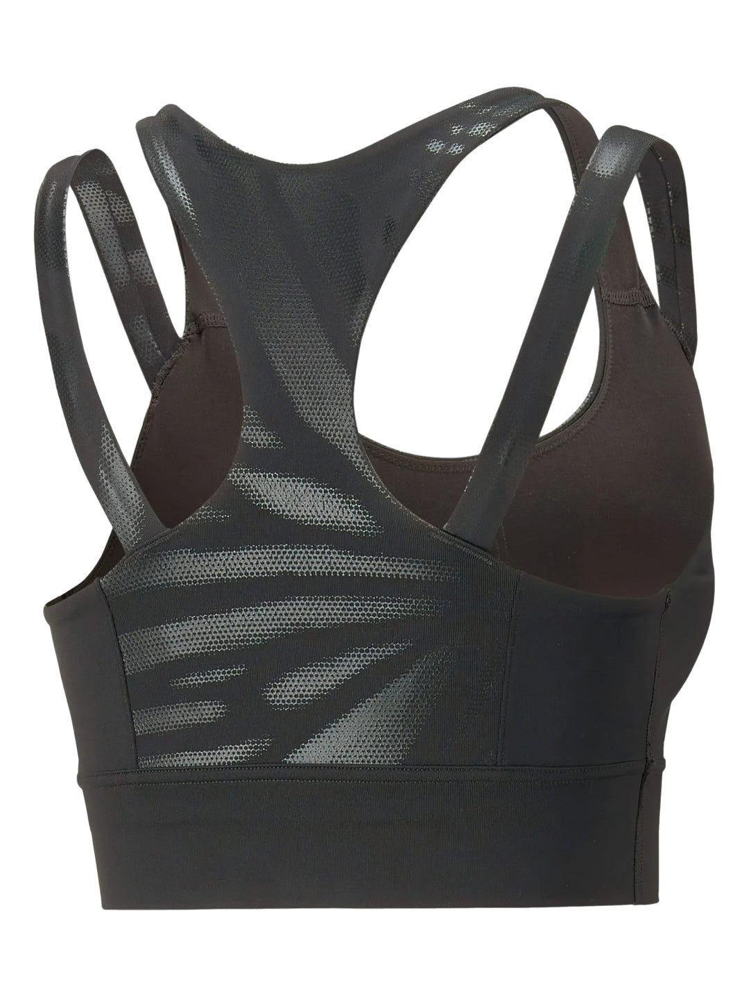 Mujer vistiendo un top deportivo PUMA color negro brillante de impacto medio con tirantes y logo frontal.