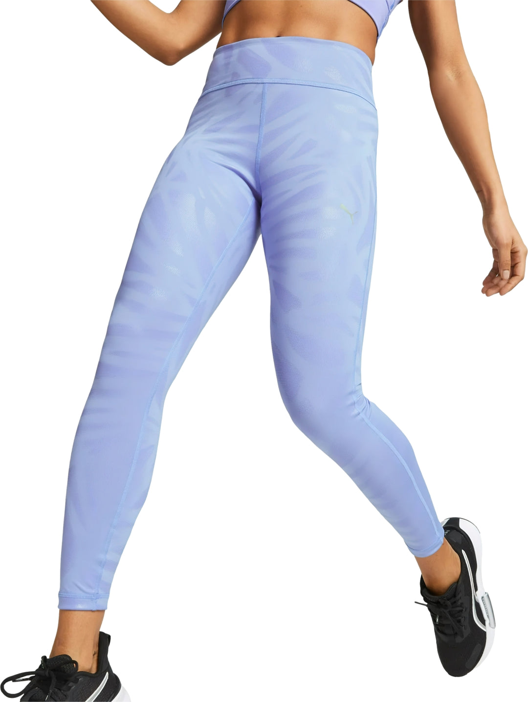 Leggings deportivos PUMA color morado claro, talle alto y largo 7/8.