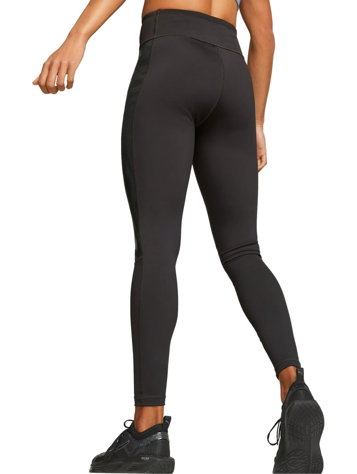 Leggings deportivos PUMA color negro de cintura alta con detalles brillantes laterales.