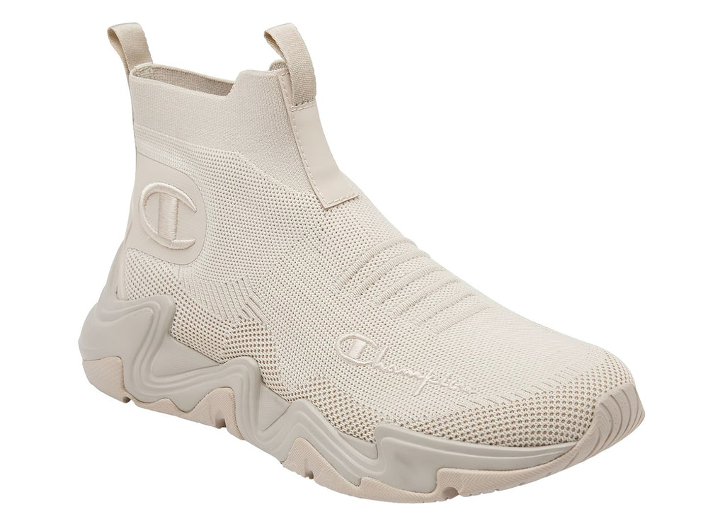 Tenis Champion color beige con suela gruesa y diseño tipo calcetín.