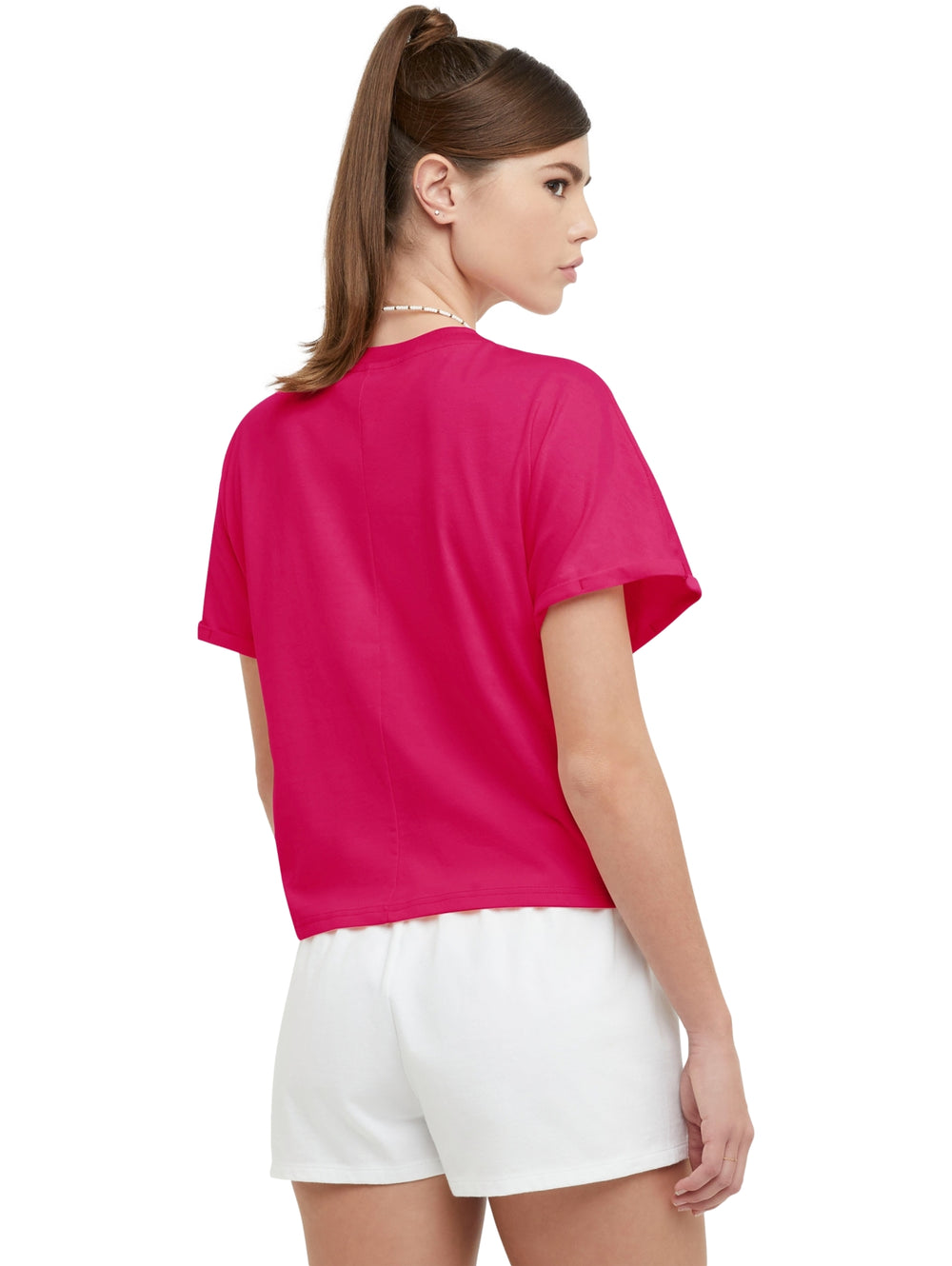 Camiseta rosa Champion para mujer con detalle de nudo en la parte frontal y cuello redondo.