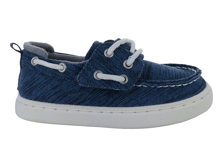 Zapato náutico infantil Sperry color azul con suela blanca y agujetas blancas.