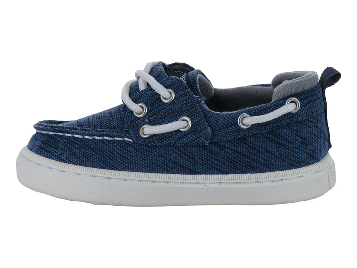 Zapato náutico infantil Sperry color azul con suela blanca y agujetas blancas.