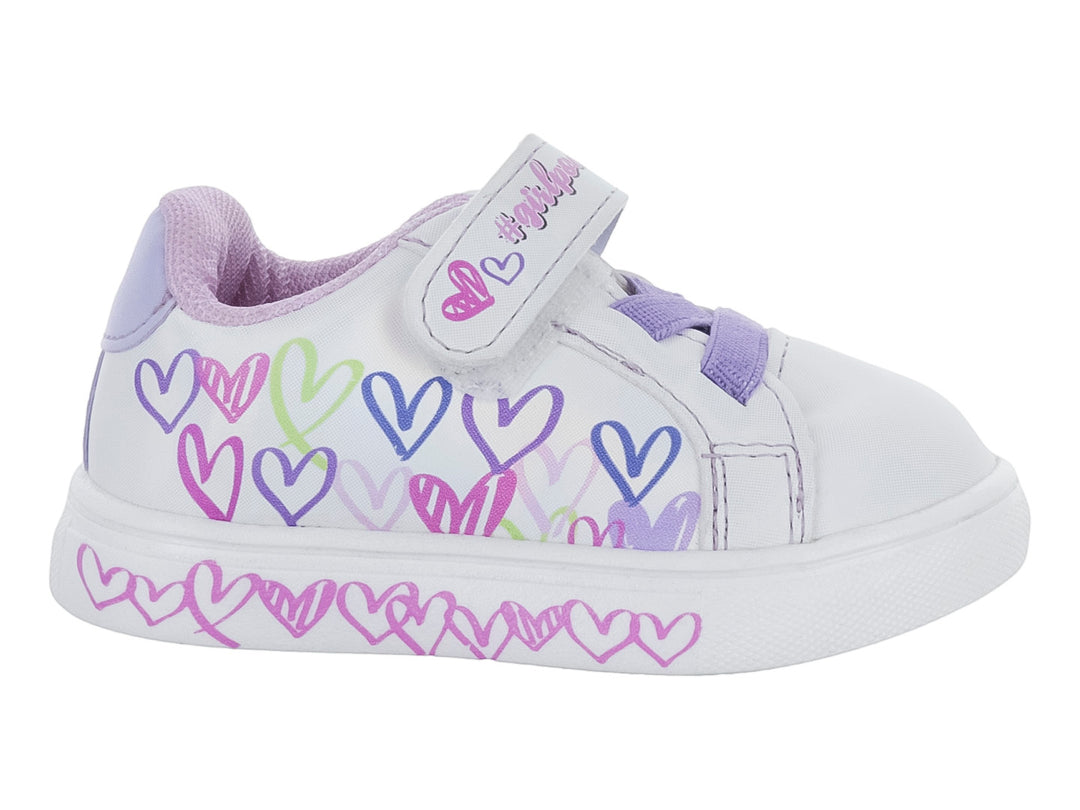 Tenis blancos para niña con estampado de corazones coloridos, agujetas moradas y cierre de velcro.
