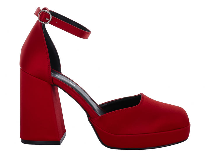 Zapato de tacón alto color rojo con plataforma y correa al tobillo.