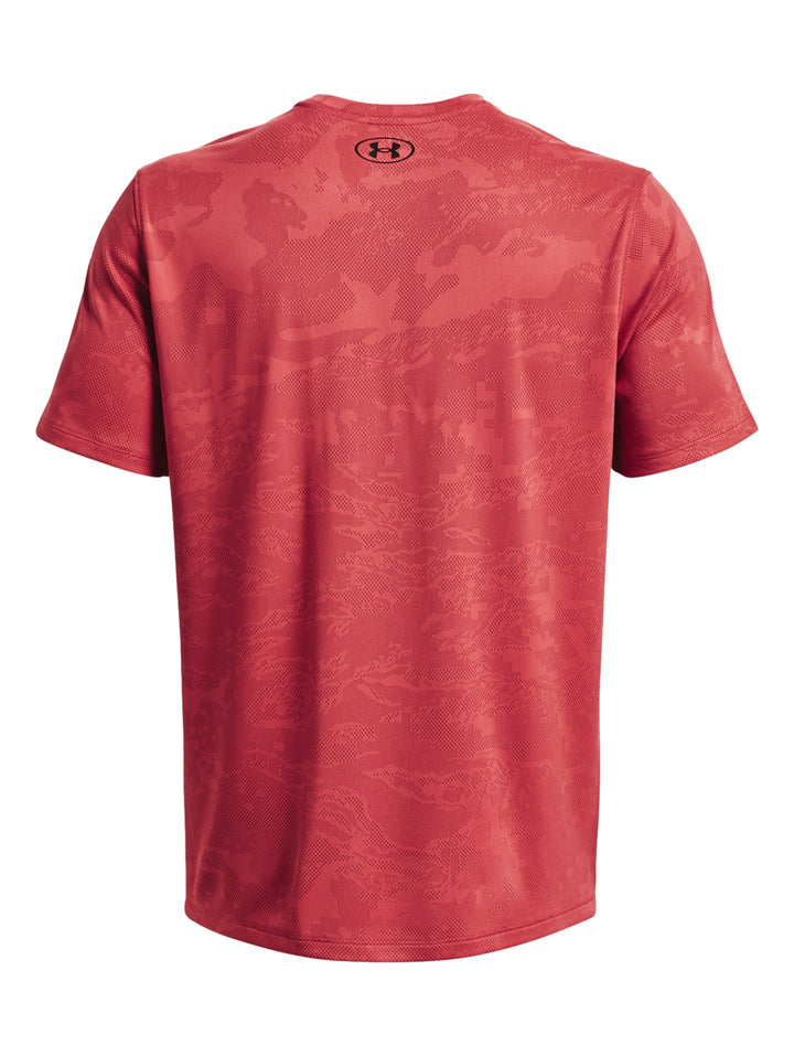 Camiseta deportiva de manga corta color rosa con patrón jacquard y logo de Under Armour.