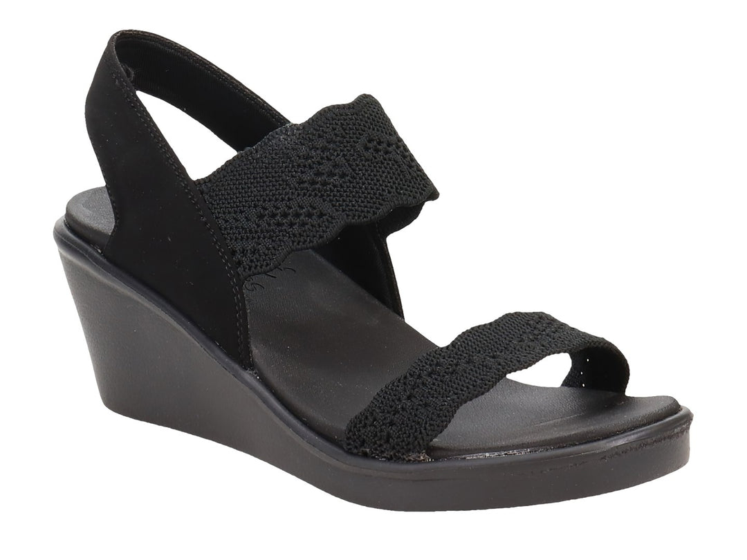 Sandalia de cuña color negro para Mujer con detalles de crochet en las correas.