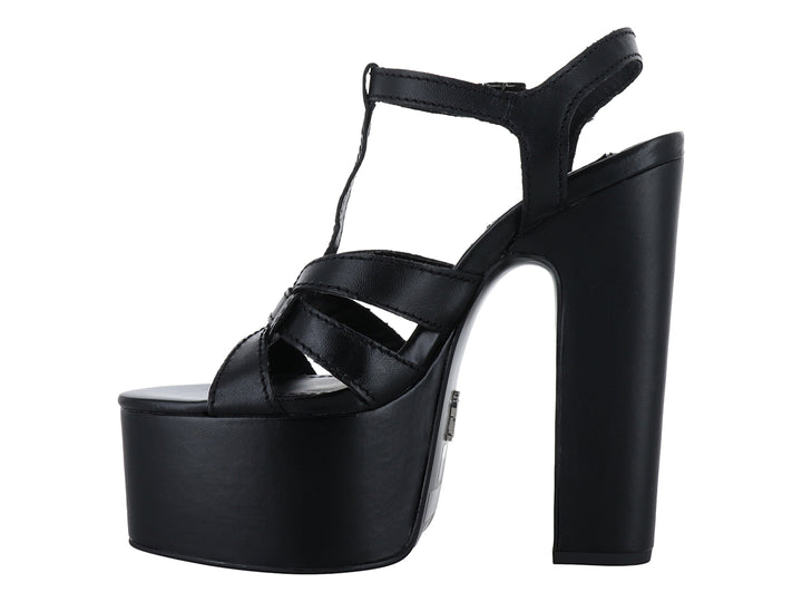 Sandalia negra de plataforma alta y tacón grueso con correas cruzadas y cierre de hebilla, marca Steve Madden.