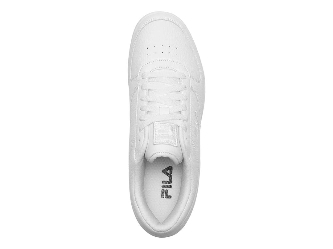 Tenis FILA A-LOW de color blanco, corte bajo, con cordones y suela blanca.