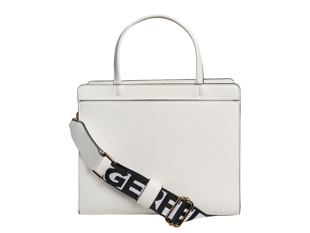 Bolso blanco rectangular de Karl Lagerfeld con estampados de corazones rojos y dorados, y figuras gráficas.