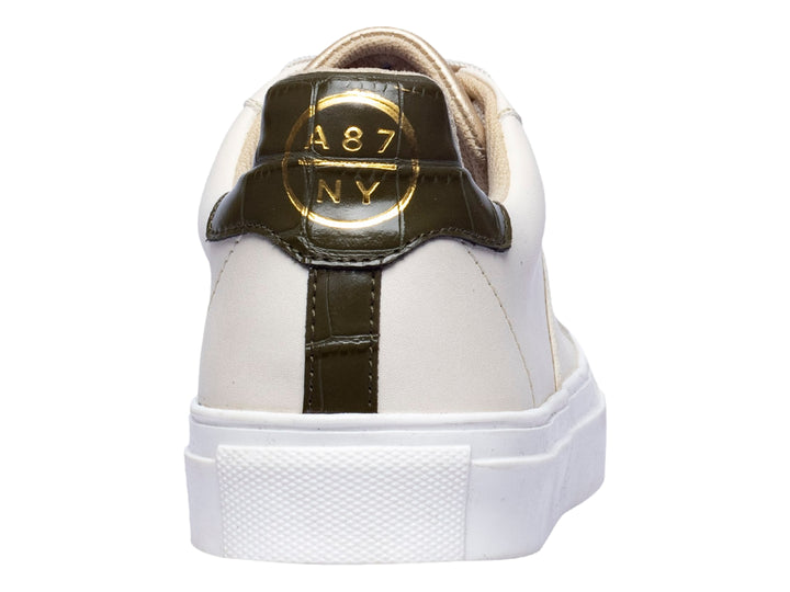 Tenis Aeropostale color beige con detalles en dorado y suela blanca para mujer.