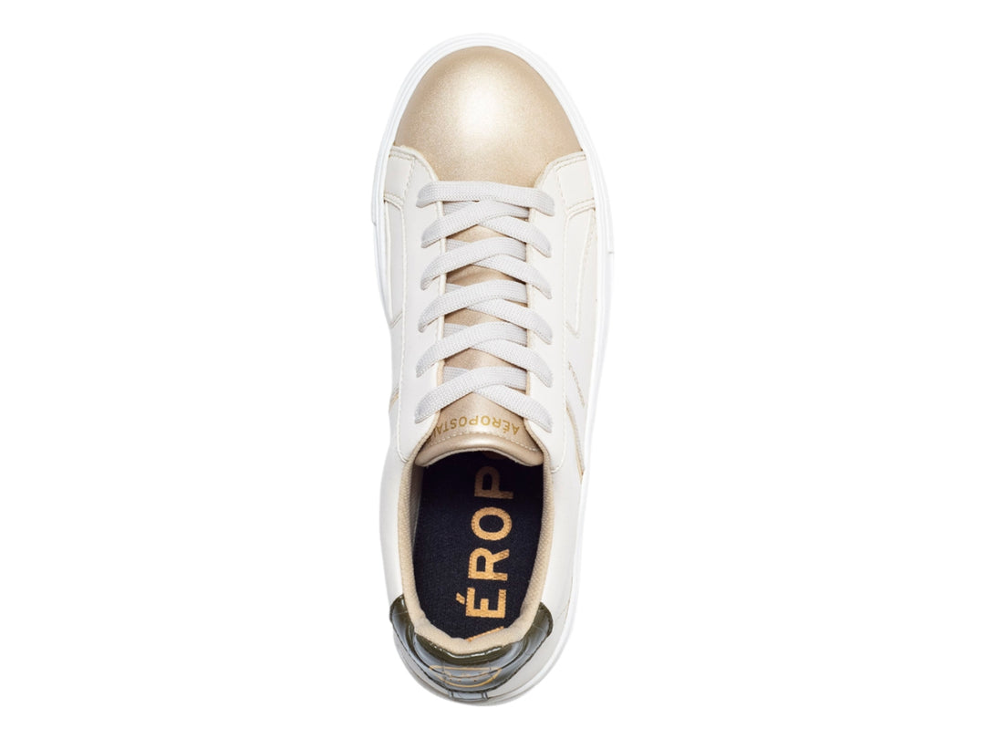 Tenis Aeropostale color beige con detalles en dorado y suela blanca para mujer.
