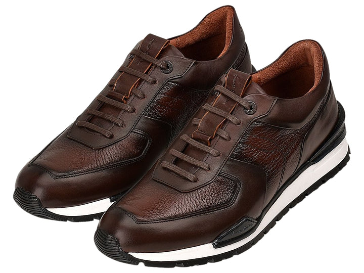 Tenis Cuadra de cuero color chocolate con suela blanca y negra para hombre.