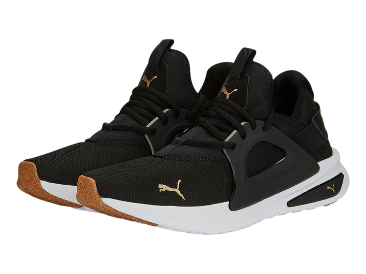 Tenis PUMA SOFTRIDE ENZO EVO color negro con suela blanca y detalles en dorado.