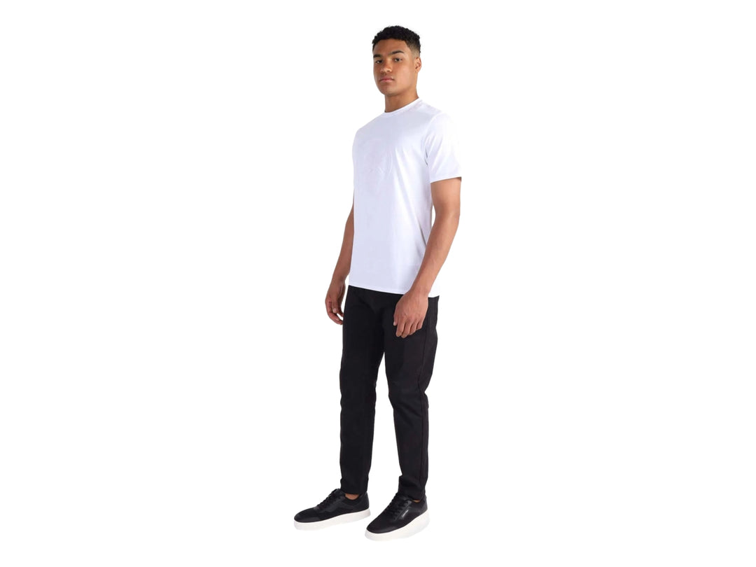 Tenis Calvin Klein negros de corte bajo con suela blanca y detalles en tejido.