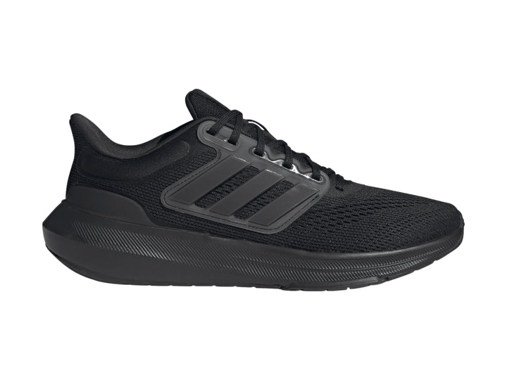 Tenis deportivos Adidas Ultrabounce en color negro total con suela gruesa y tejido transpirable.