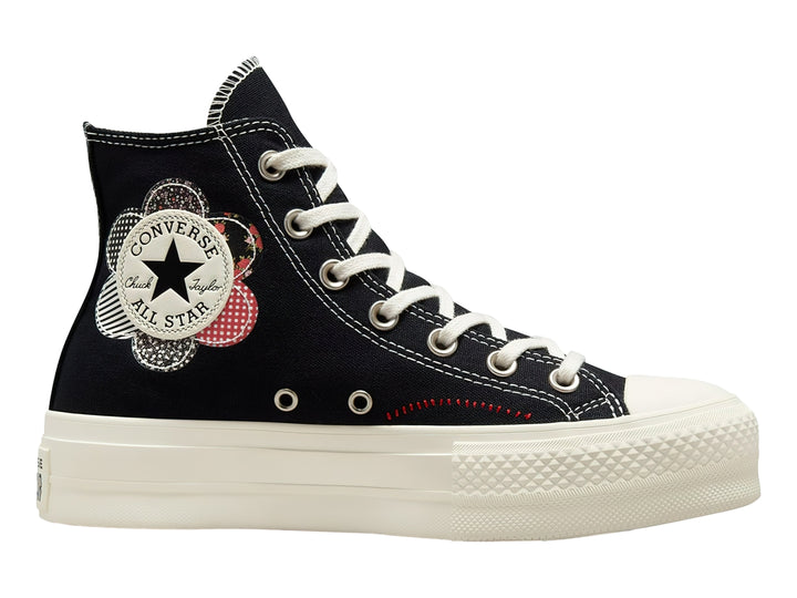 Tenis Converse Chuck Taylor All Star Lift HI color negro con suela de plataforma blanca y detalle floral lateral.