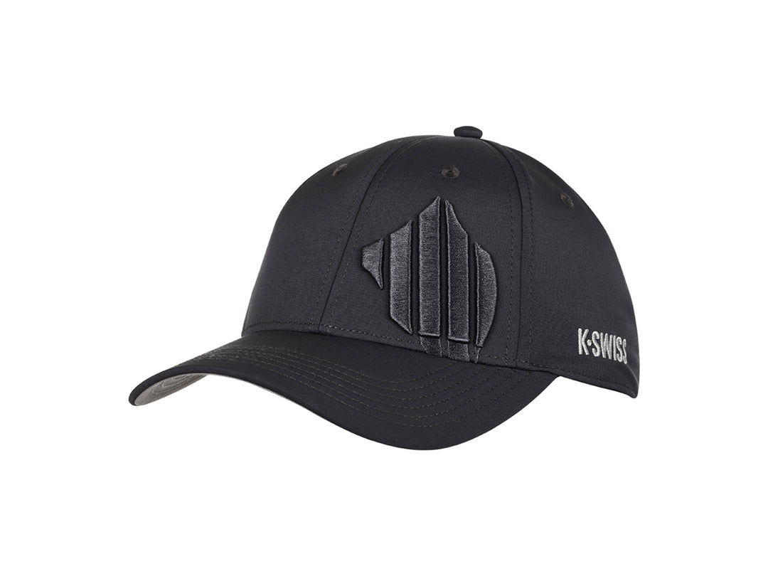 Gorra deportiva K-Swiss en color gris oscuro con logotipo frontal en relieve y visera curva.